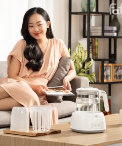 May dun va ham nuoc pha sua dien tu Quick 16 011
