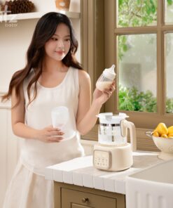 May dun va ham nuoc pha sua dien tu quick 15 plus 11